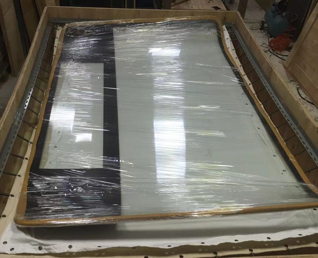 大型鋼化玻璃出口到尼泊爾,彈簧蹦床包裝方案——一次危險品進出口包裝方案的飛躍！